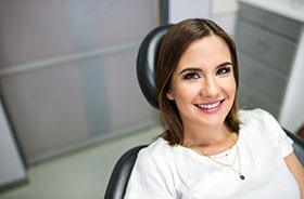 Female patient relaxing before dental implant placement surgery