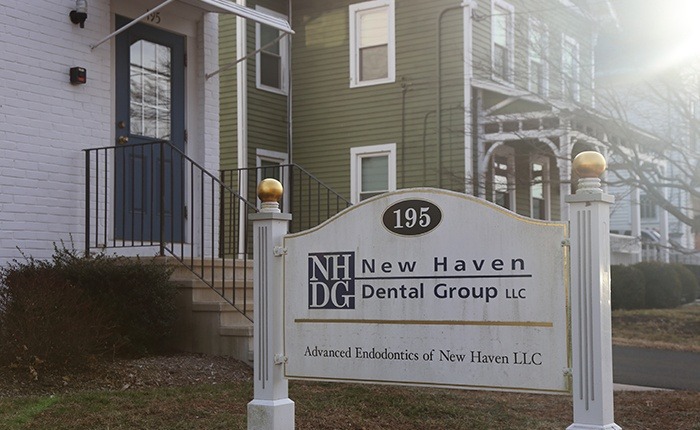 New Have Dental Group sign on building
