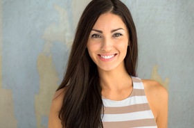 Woman with beautiful smile and tooth-colored fillings in Branford