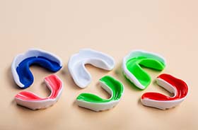 Colorful mouthguards to prevent dental emergencies in Branford