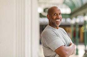 Healthy, confident man with dental implants in Branford