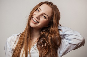 Young woman with ceramic braces