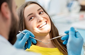 Smiling woman in dental chair