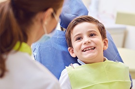 Smiling child in dental chair