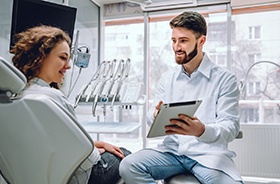 Dentist and patient discussing treatment