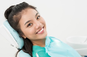 Smiling woman in dental chair