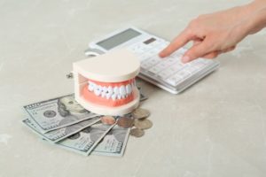 Using calculator to budget for root canal cost in Branford