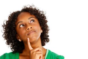 Woman wearing curious, thoughtful expression