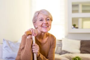 Smiling senior woman with dentures